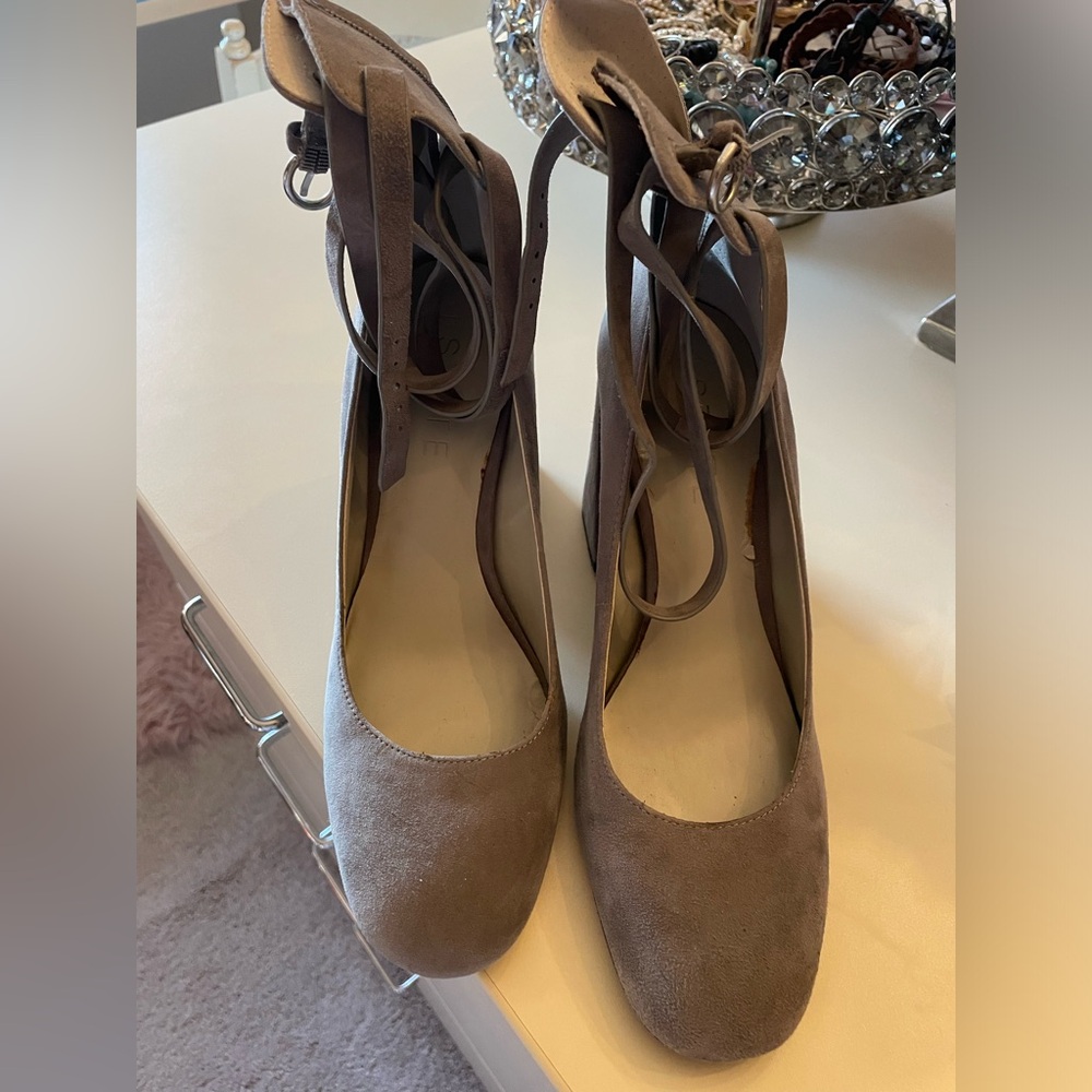 1State grey suede pump with ankle strap and zipper up the back
